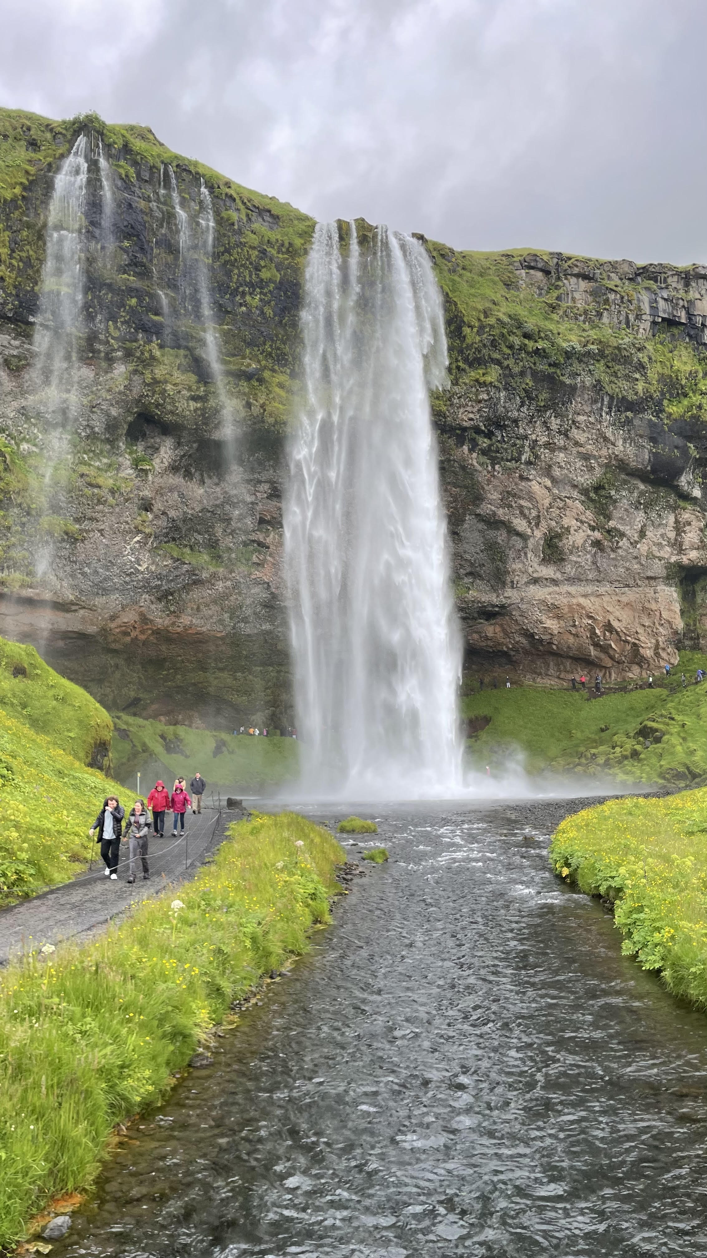 Waterfall cascading through the Icelandic landscape