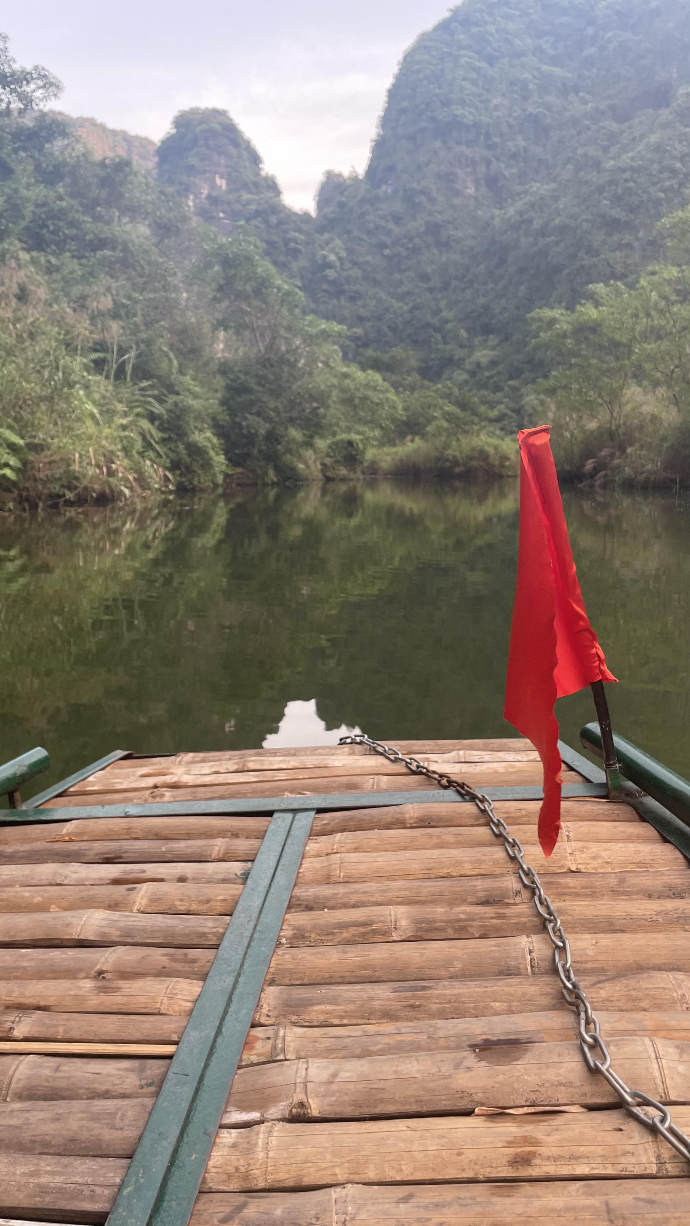 Rowboat through the river caves at Trang An, Ninh Binh, Vietnam